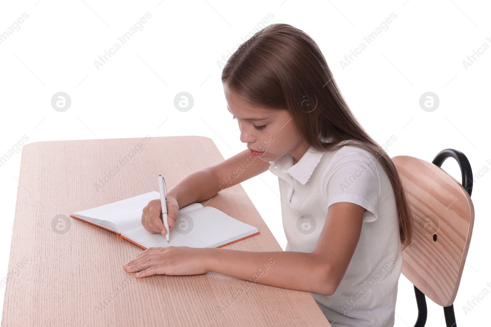 Photo of Girl with incorrect posture and notebook sitting at wooden desk on white background