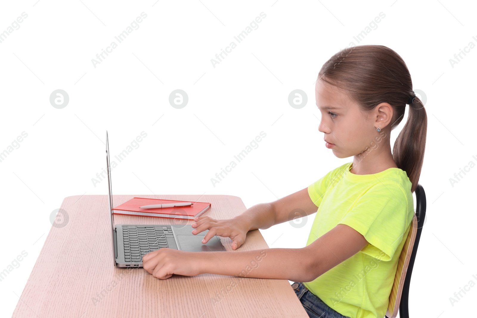 Photo of Girl with correct posture using laptop at wooden desk on white background