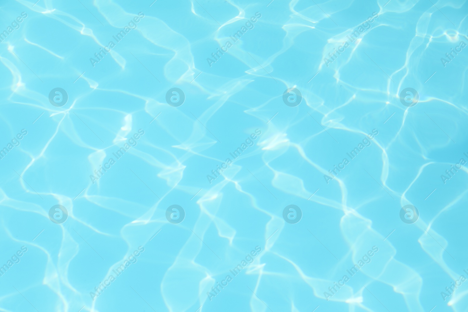 Photo of Clear water in outdoor swimming pool on sunny day