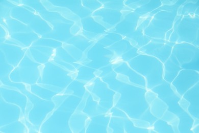 Clear water in outdoor swimming pool on sunny day