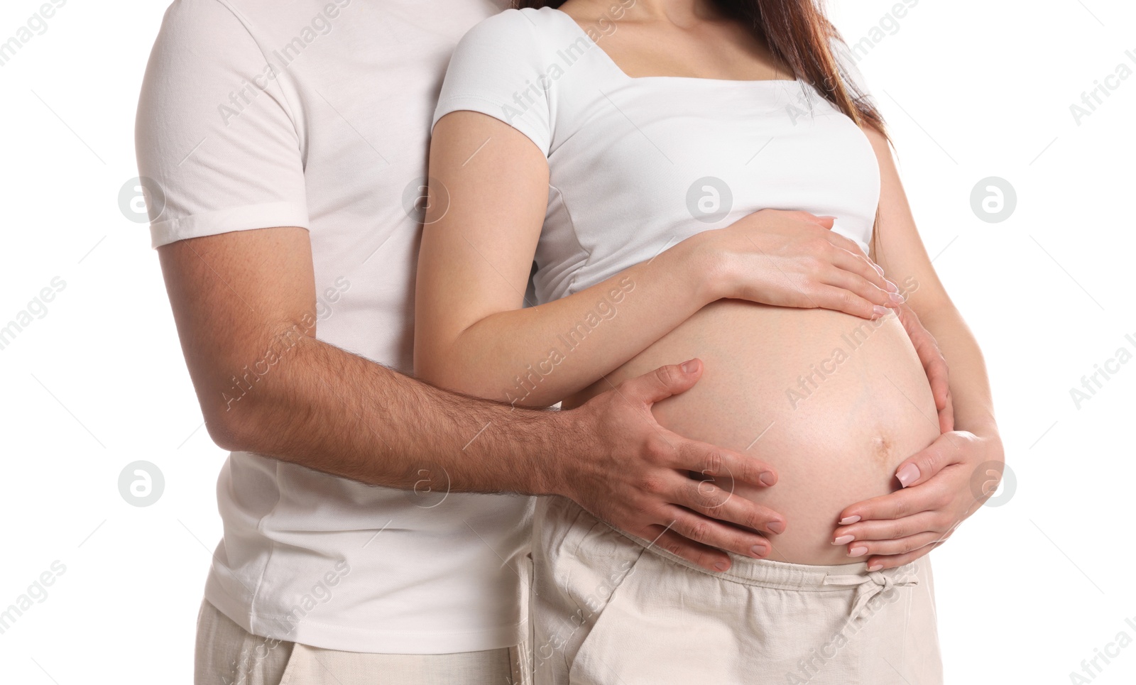 Photo of Pregnant woman with her husband isolated on white, closeup