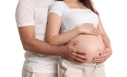 Photo of Pregnant woman with her husband isolated on white, closeup