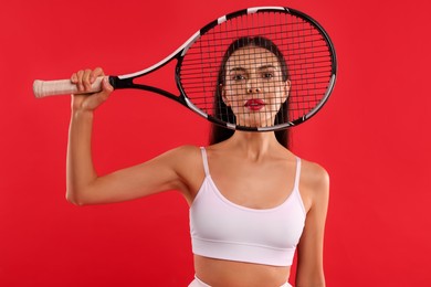 Photo of Beautiful young woman with tennis racket on red background