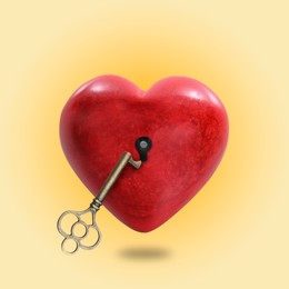 Image of Heart with keyhole and key on golden gradient background