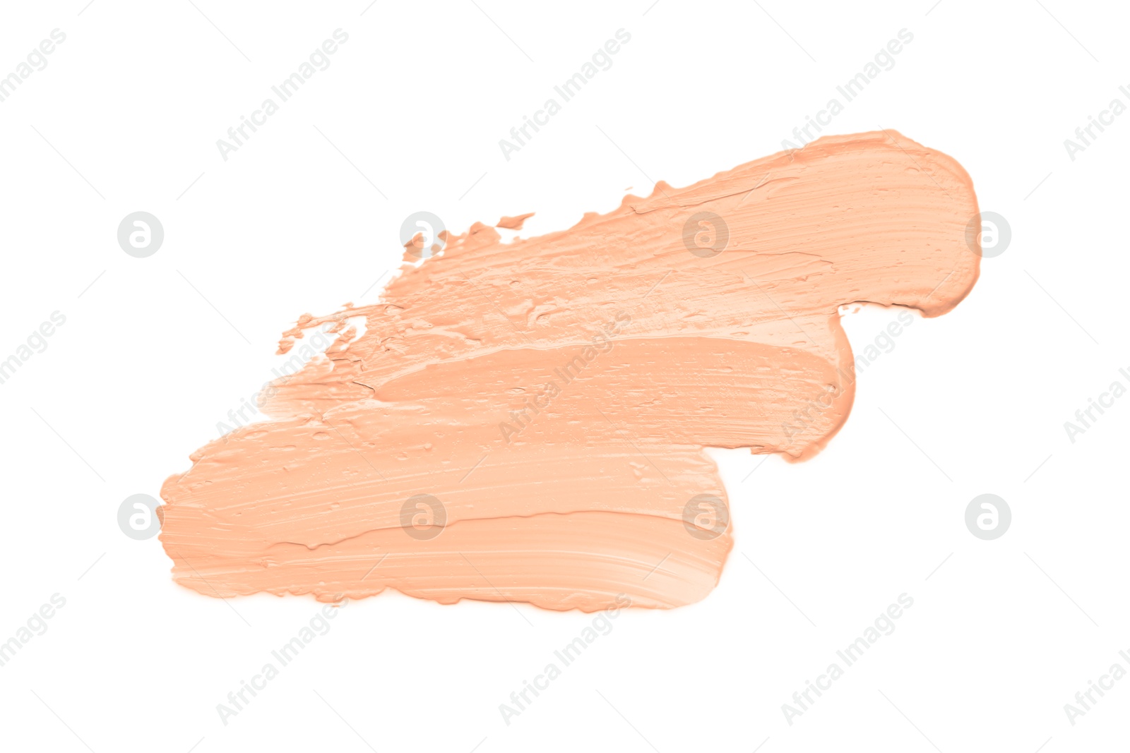 Image of Skin foundation on white background, top view. Peach fuzz color