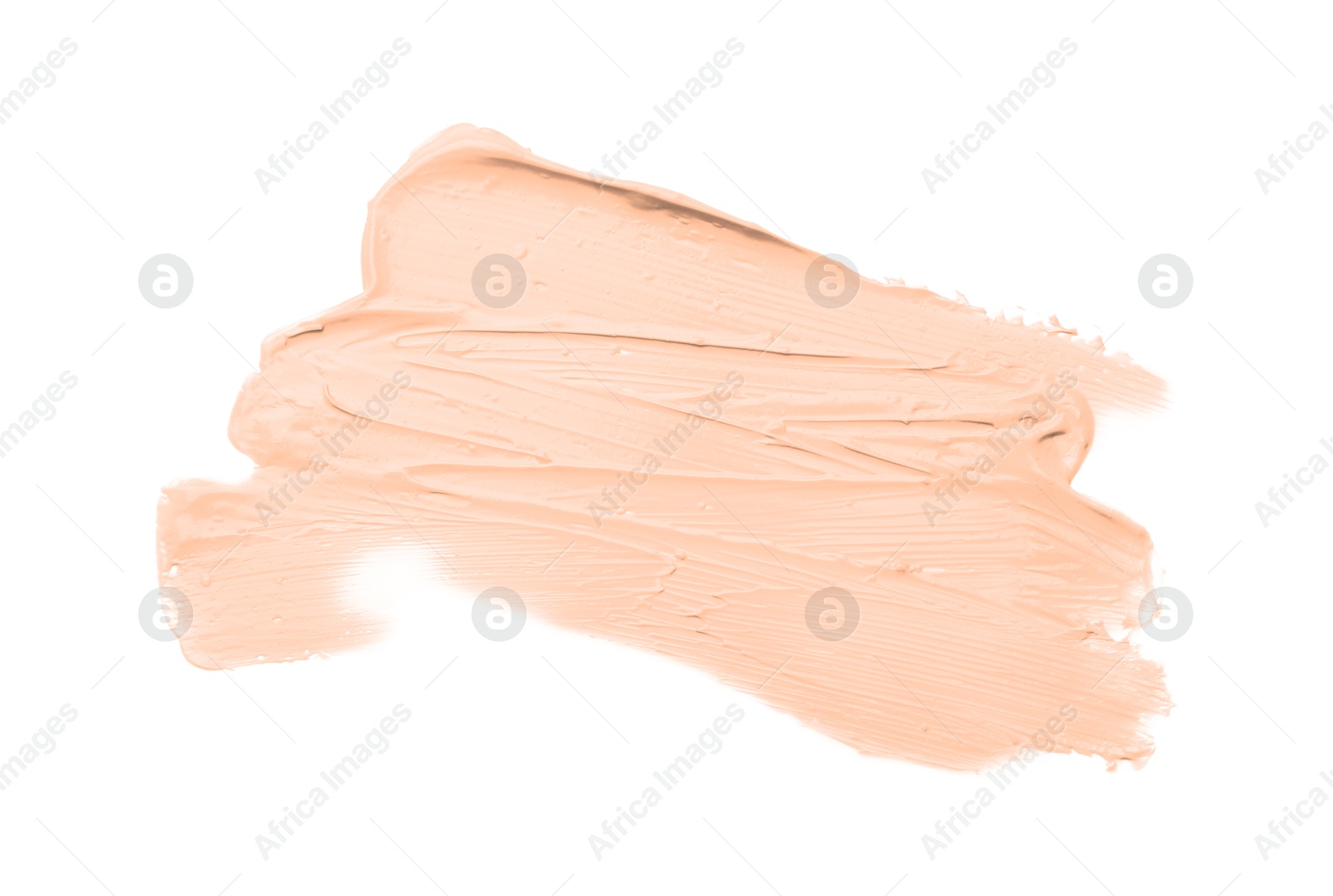 Image of Skin foundation on white background, top view. Peach fuzz color