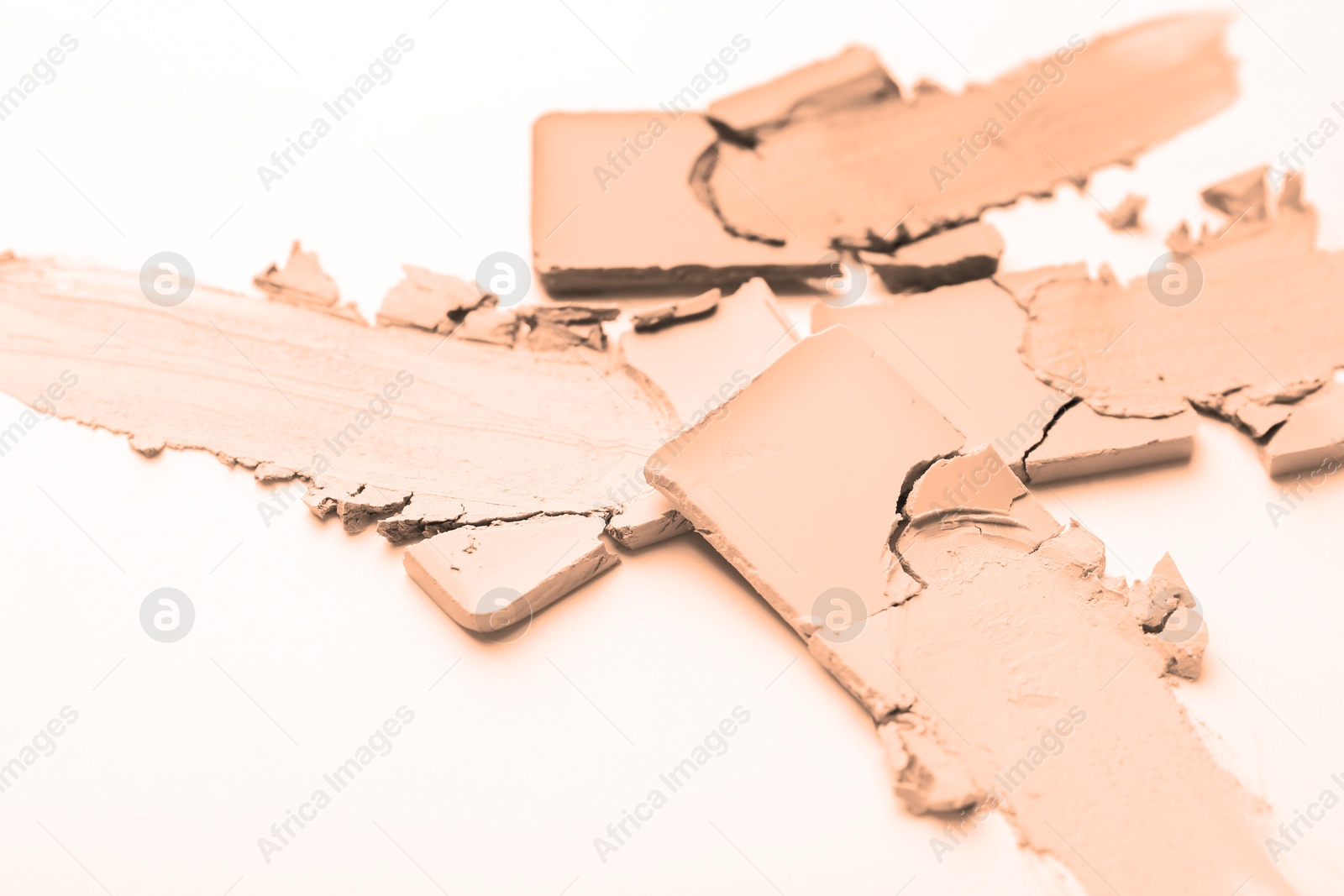 Image of Powders of different shades on white background, closeup