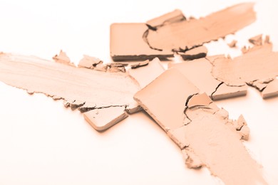 Image of Powders of different shades on white background, closeup