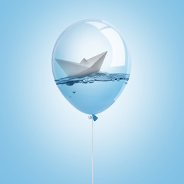 Image of Paper boat floating on water inside balloon against light blue background