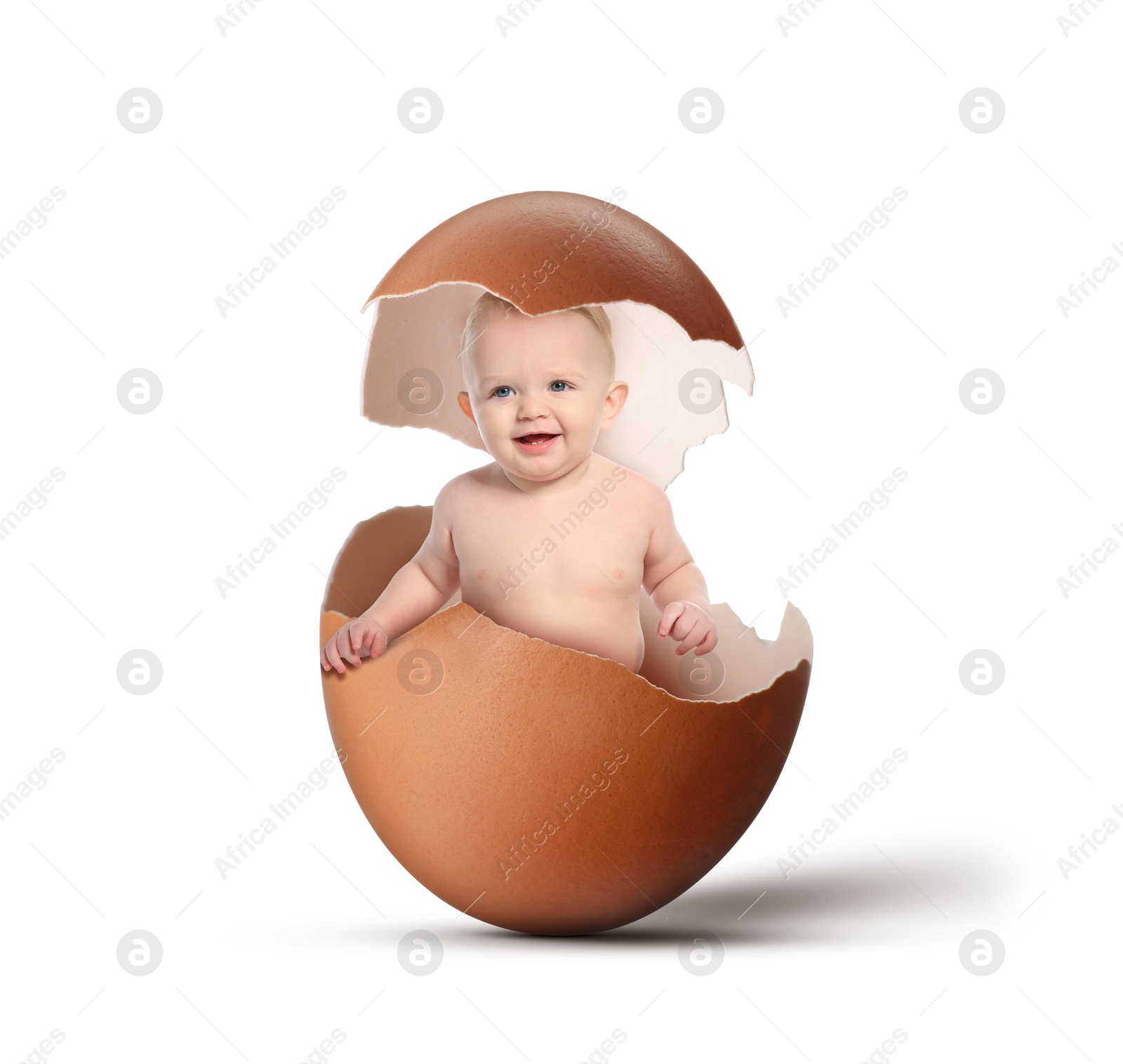 Image of Cute little baby in eggshell on white background