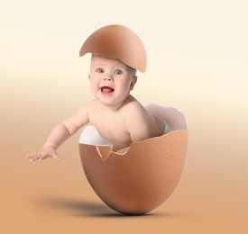 Cute little baby in eggshell on beige gradient background