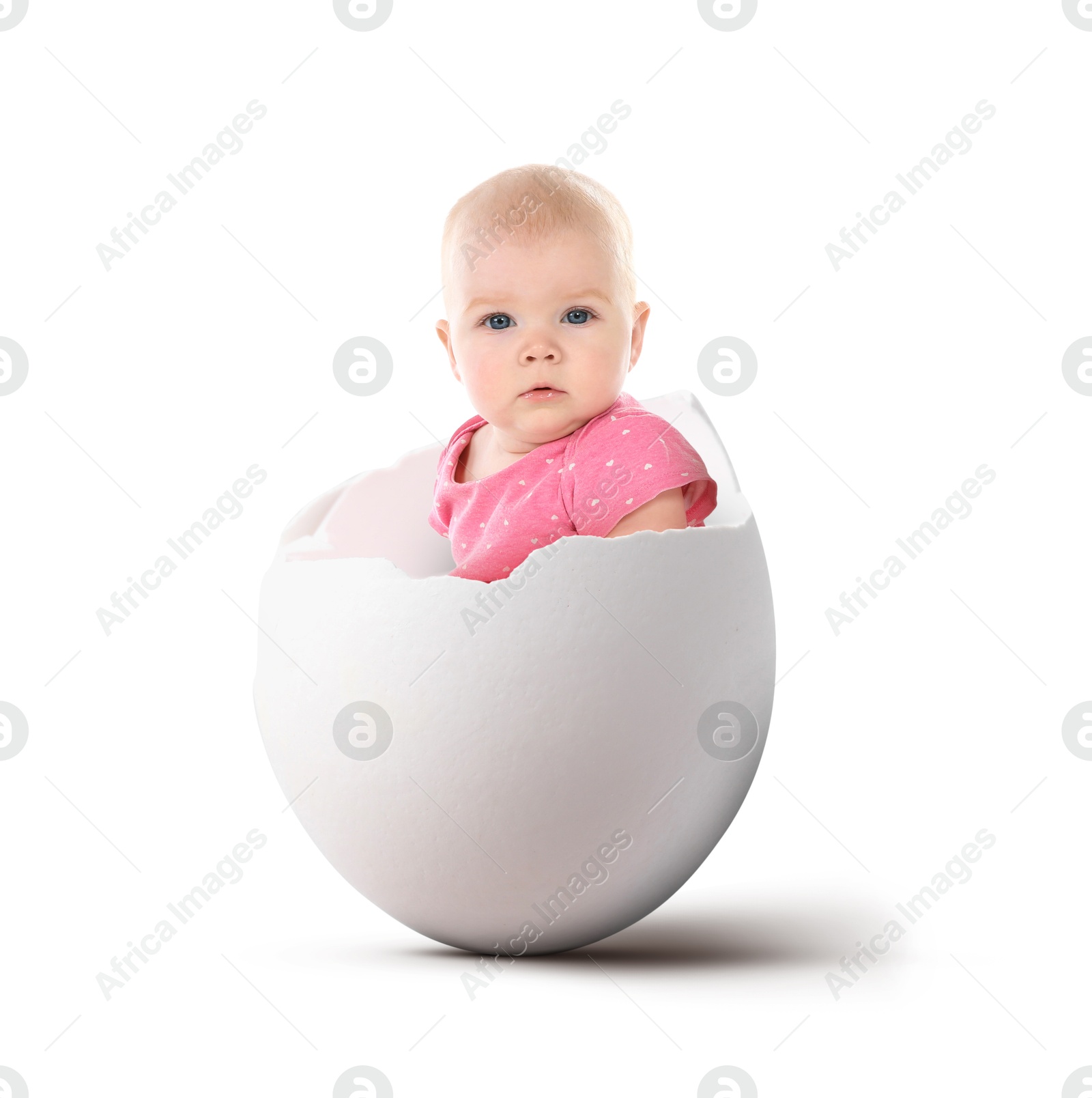 Image of Cute little baby in eggshell on white background