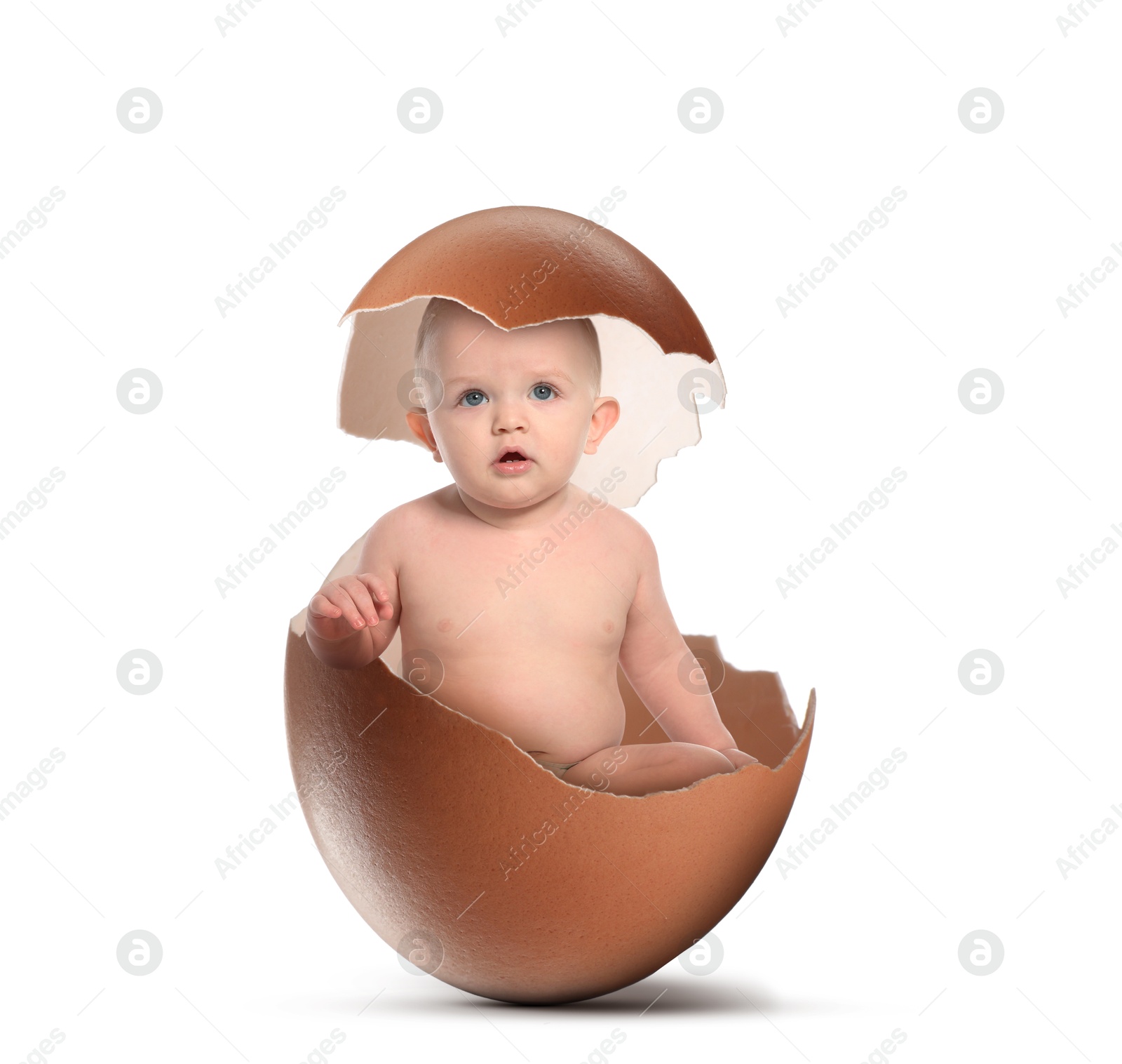 Image of Cute little baby in eggshell on white background