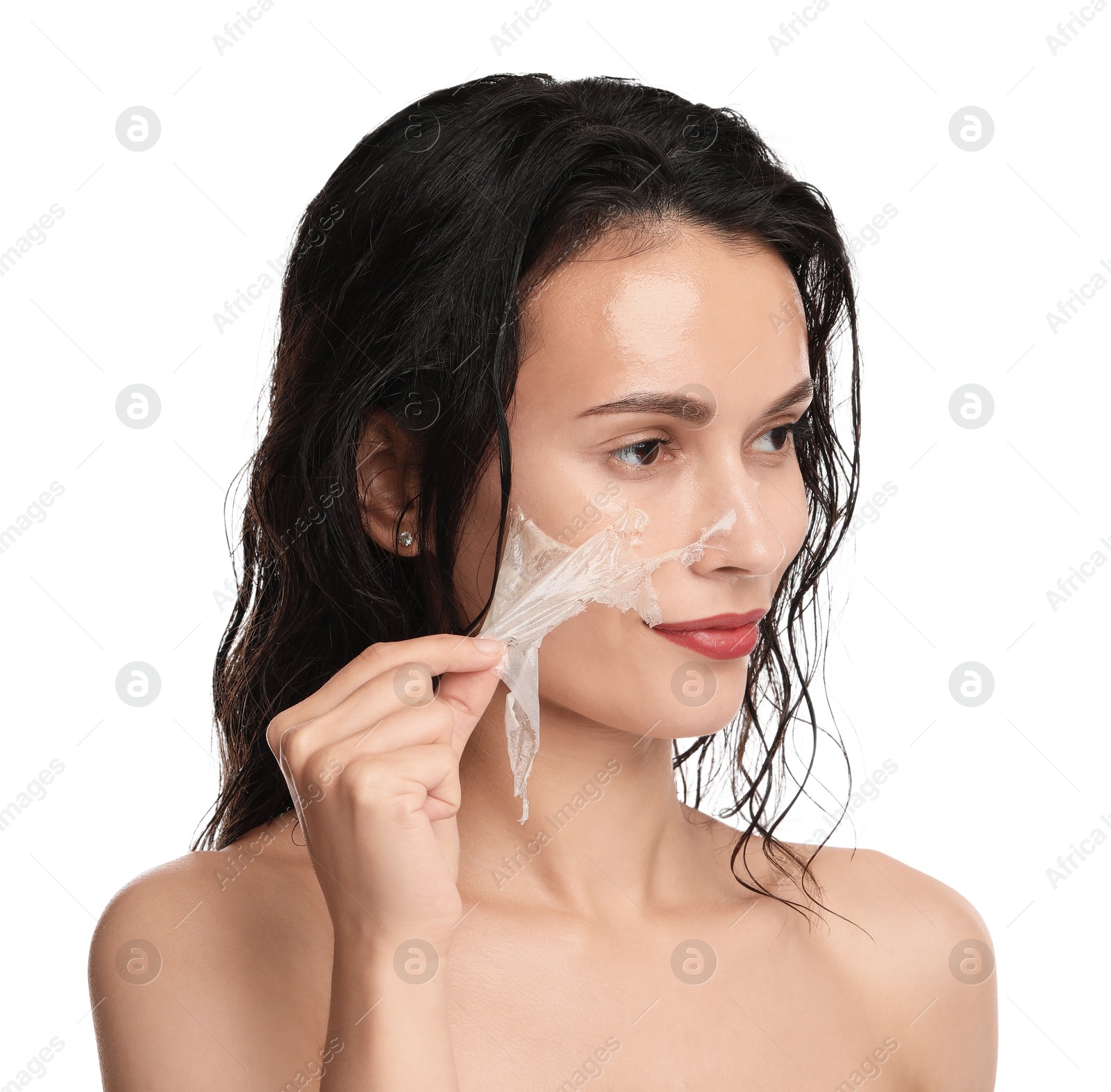 Photo of Beautiful woman peeling off face mask on white background