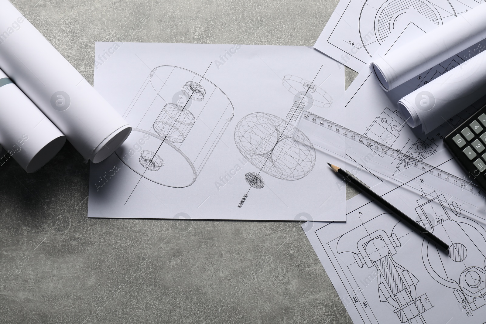 Photo of Different engineering drawings and tools on gray textured table, flat lay