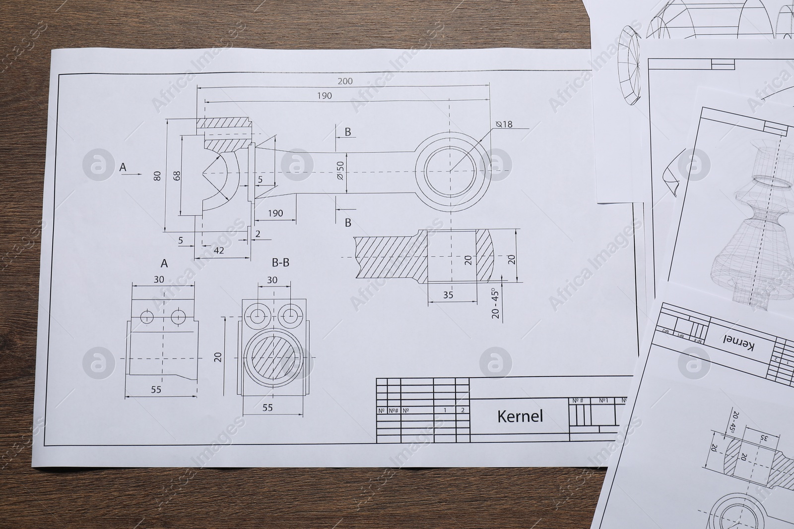 Photo of Different architectural drawings on wooden table, top view