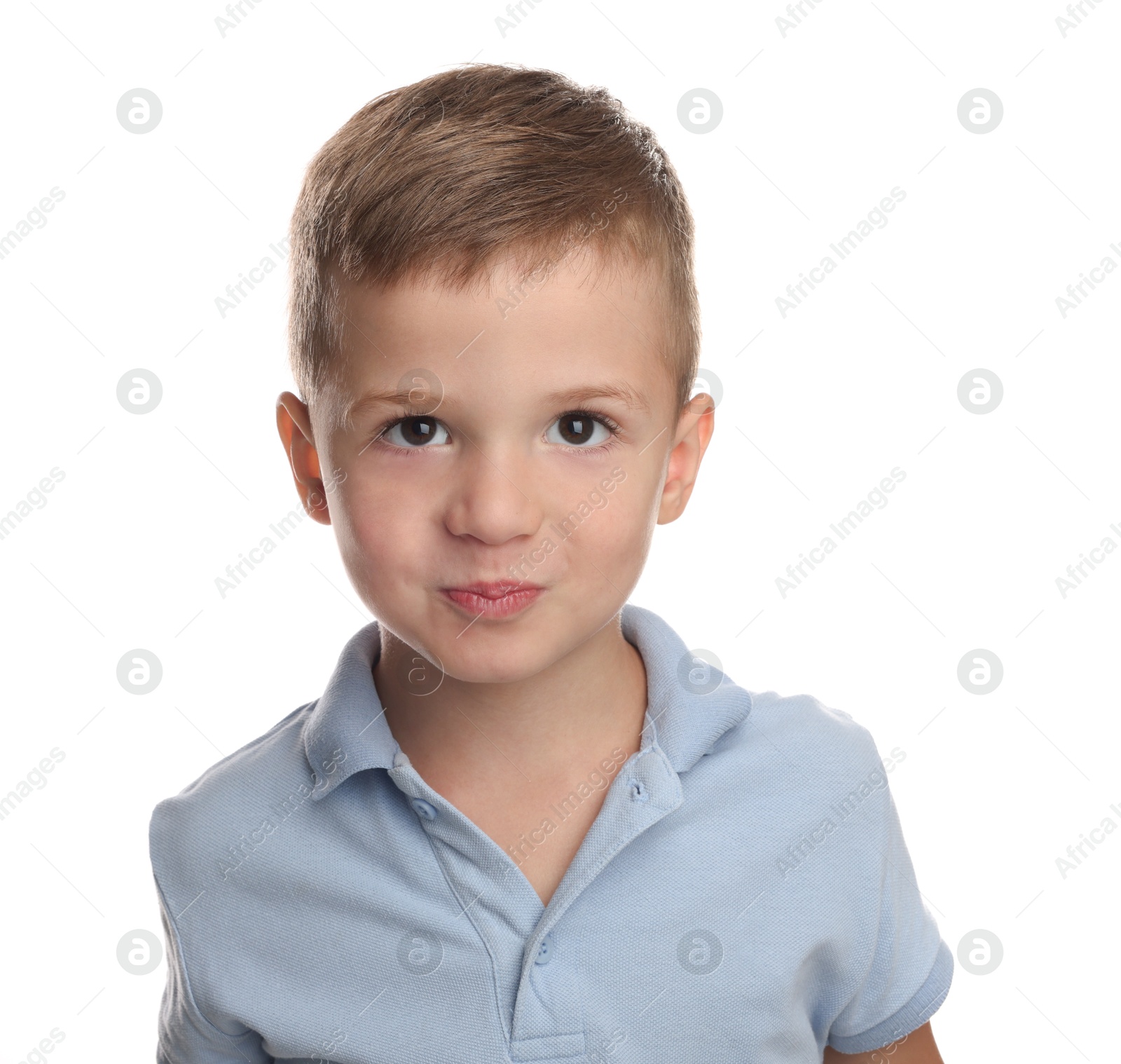 Photo of Portrait of cute little boy on white background