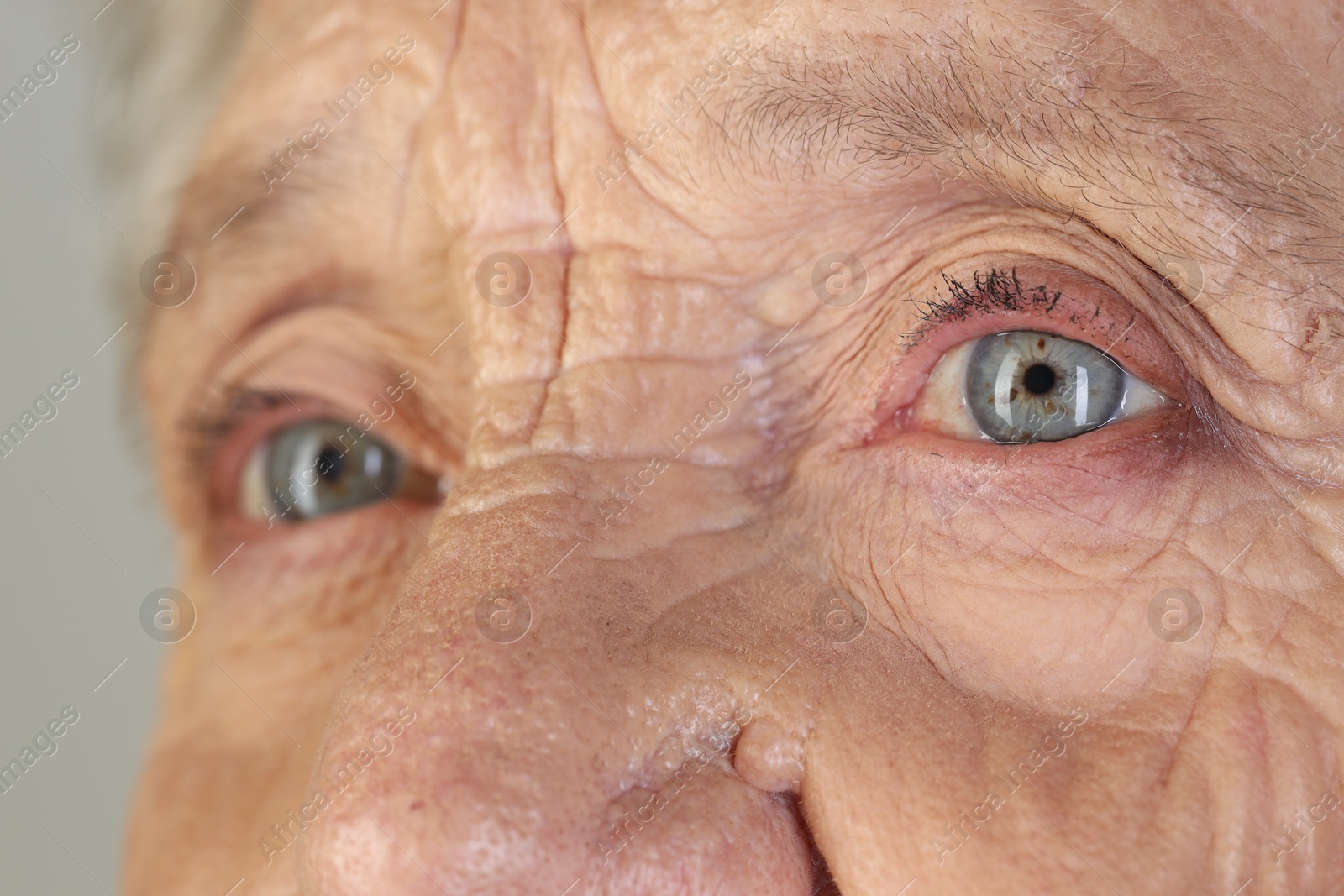 Photo of Senior woman with beautiful eyes, closeup view