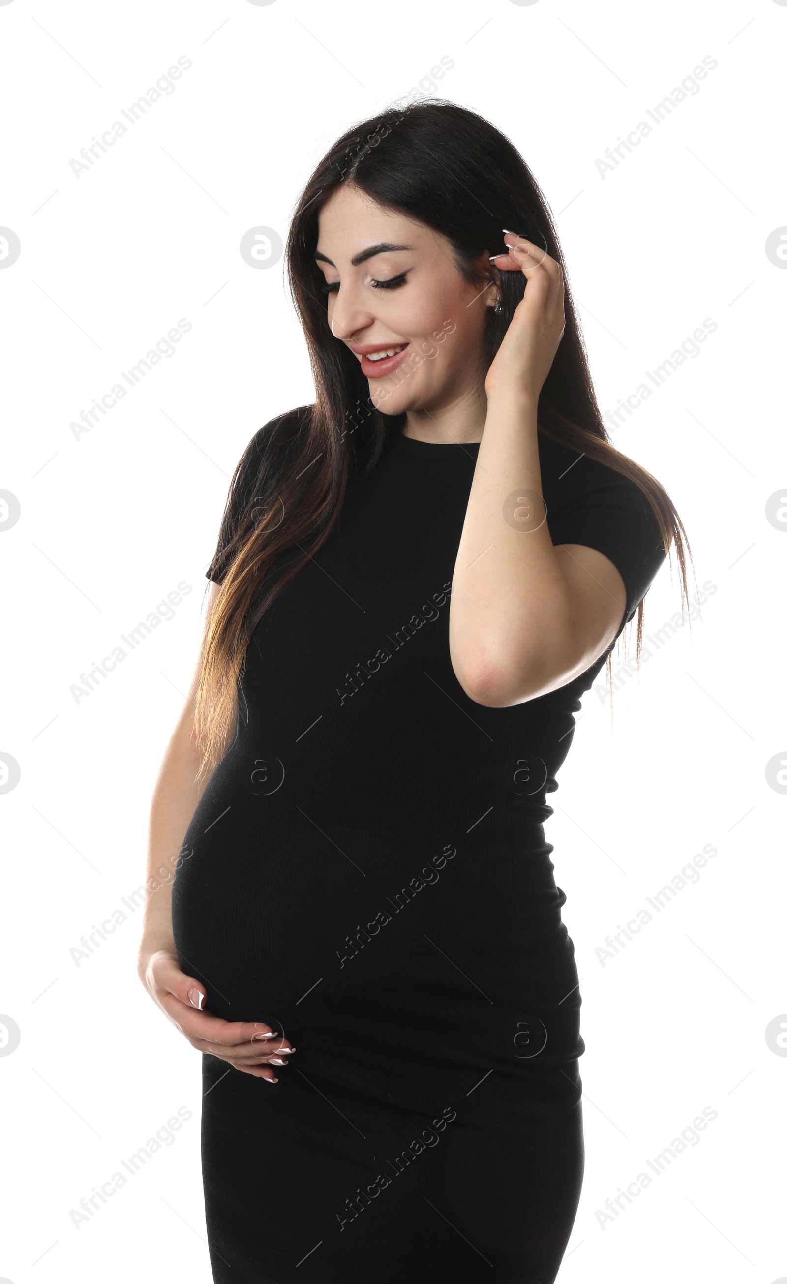 Photo of Portrait of beautiful pregnant woman on white background