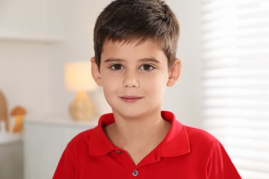 Photo of Portrait of cute little boy at home