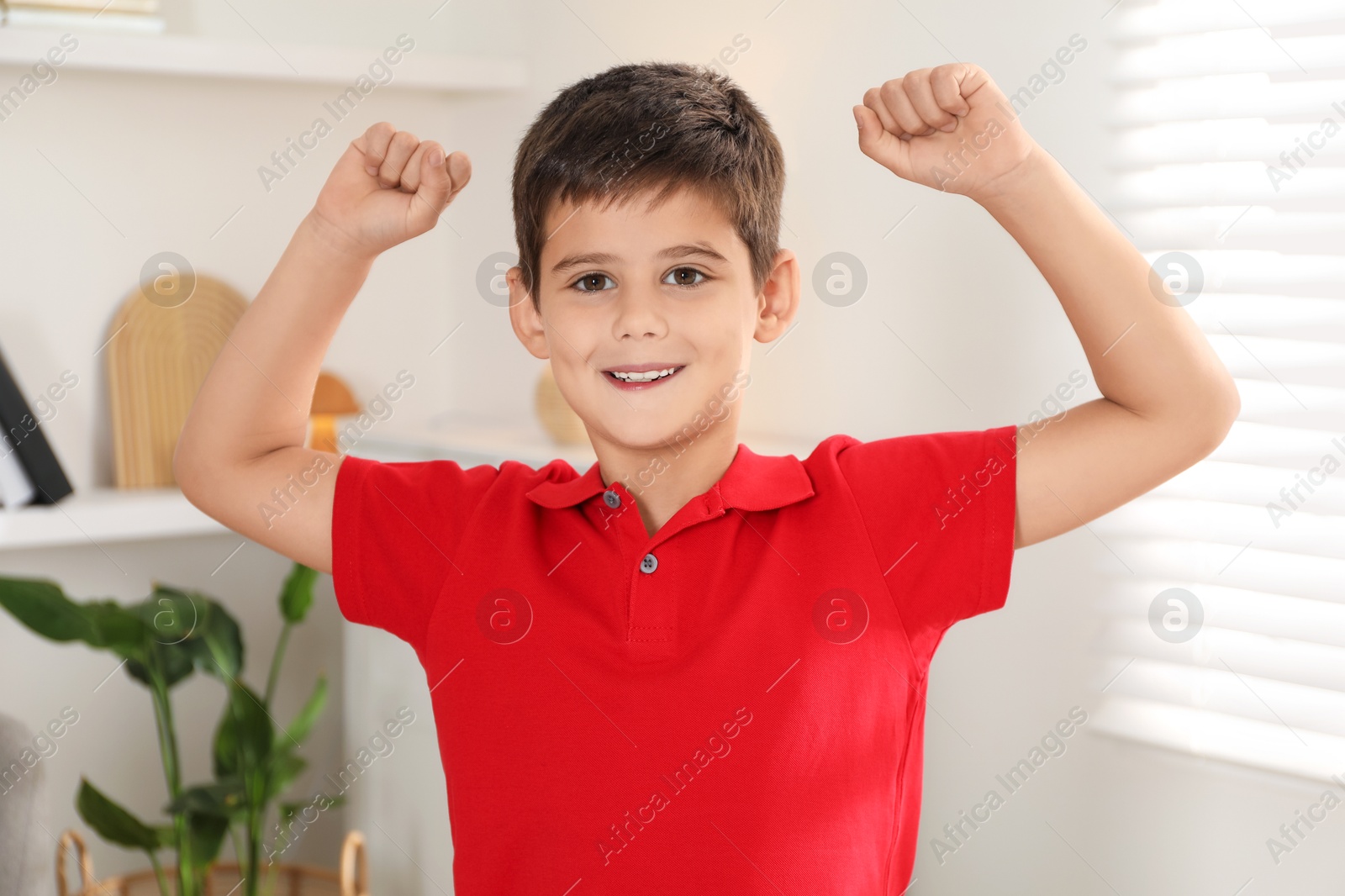 Photo of Portrait of cute little boy at home