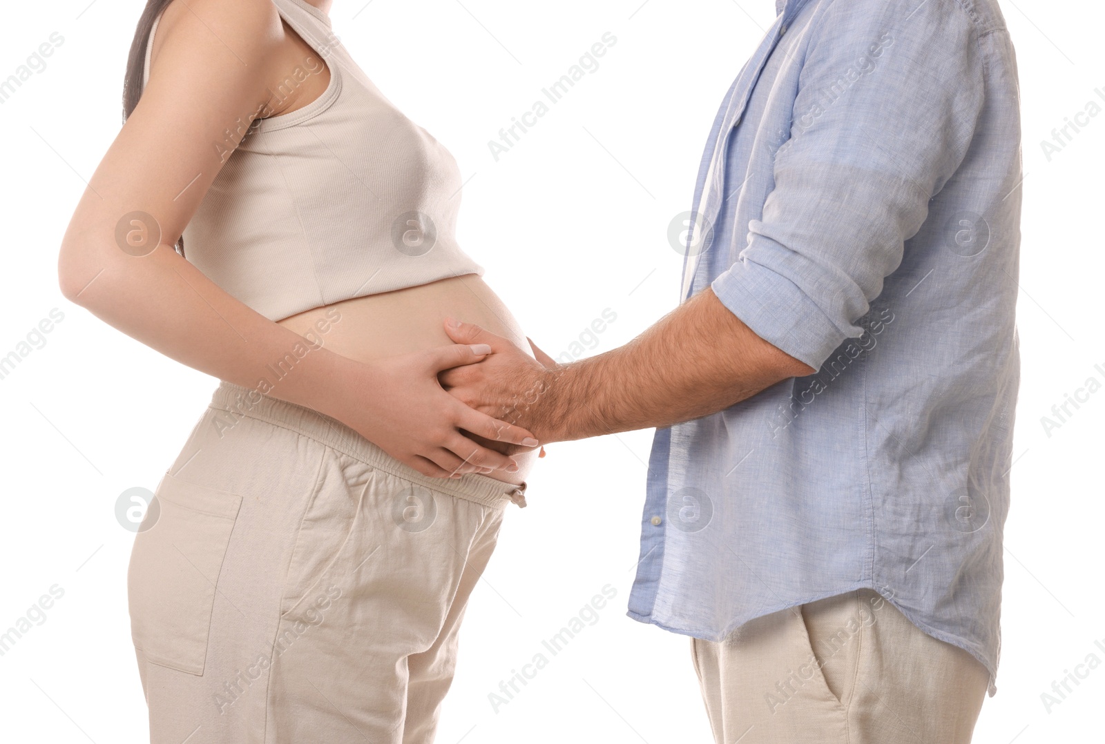 Photo of Pregnant woman with her husband isolated on white, closeup