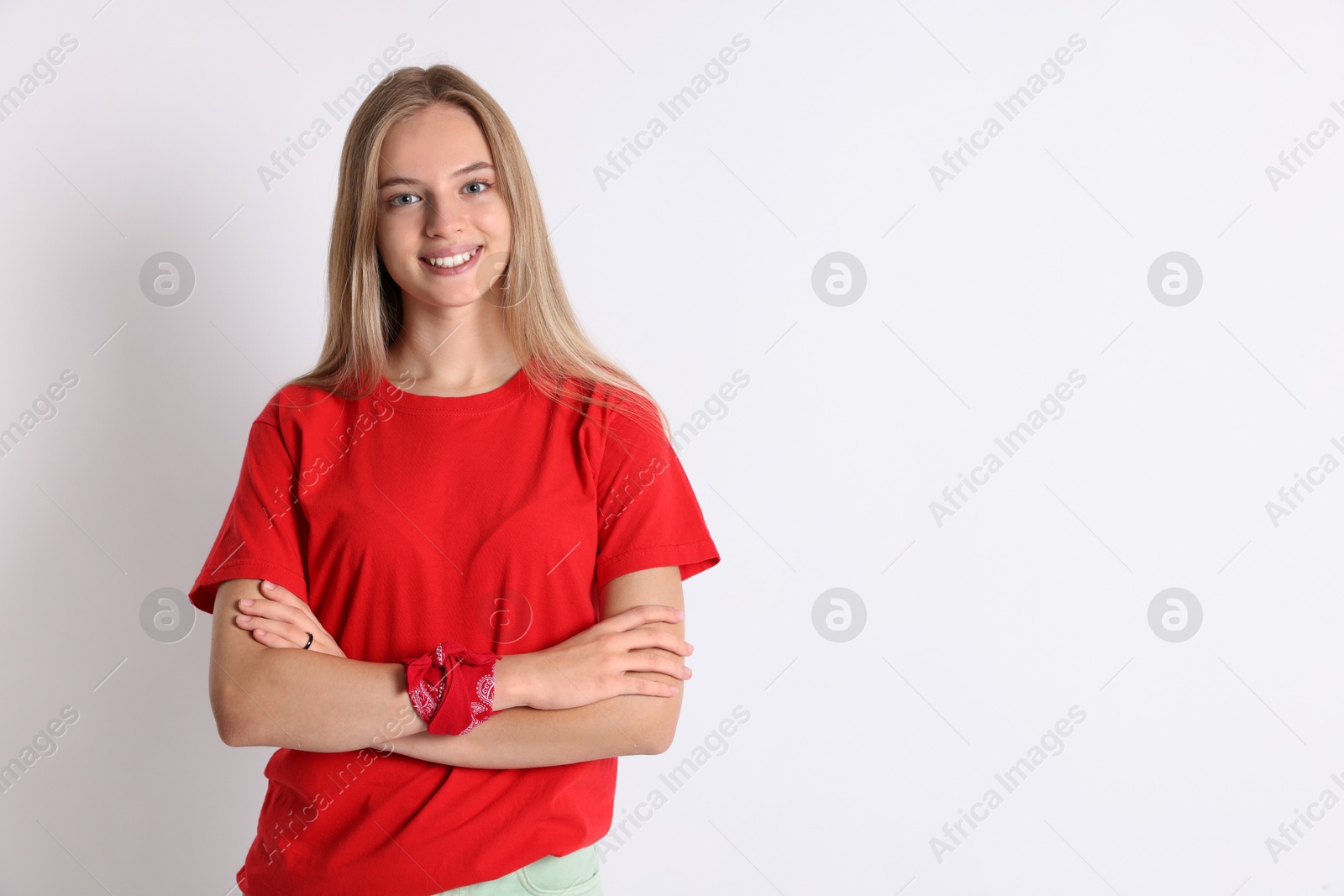 Photo of Portrait of teenage girl on white background, space for text