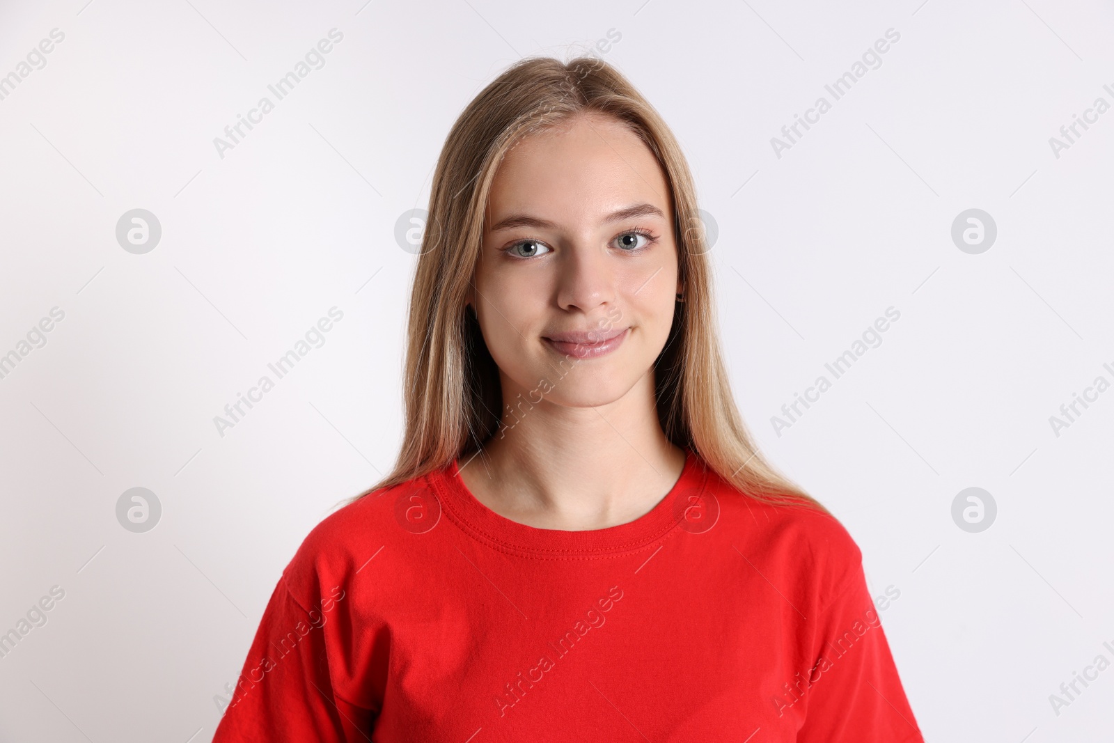 Photo of Portrait of teenage girl on white background