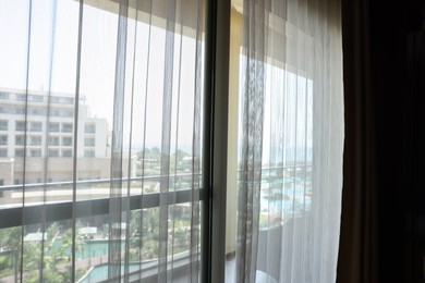 Photo of Window with light tulle in hotel room