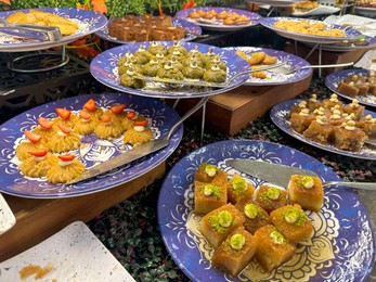 Different tasty desserts on table. Buffet service