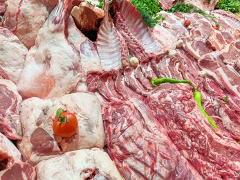 Photo of Closeup view of fresh cut raw meat and vegetables