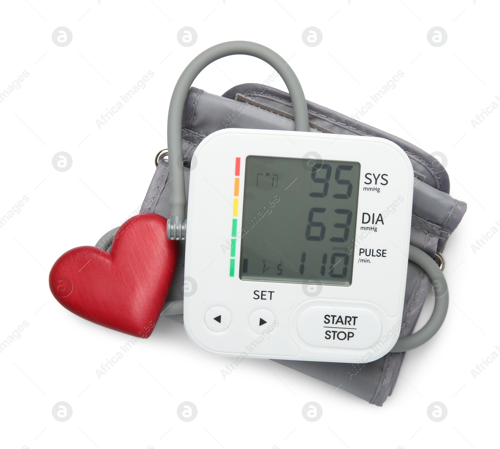 Photo of Blood pressure measuring device and red heart figure isolated on white, top view