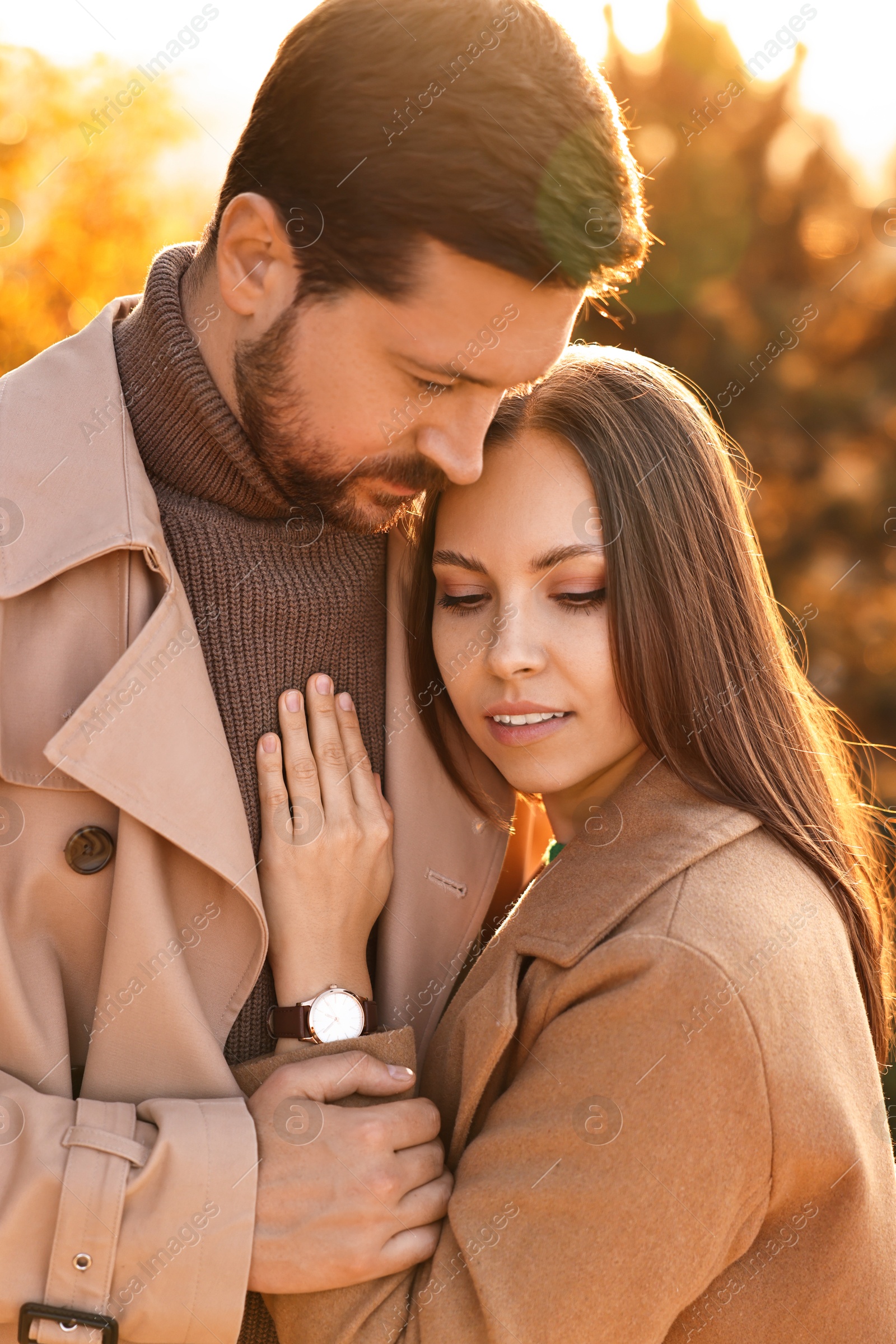 Photo of Beautiful couple enjoying their time together outdoors in autumn evening