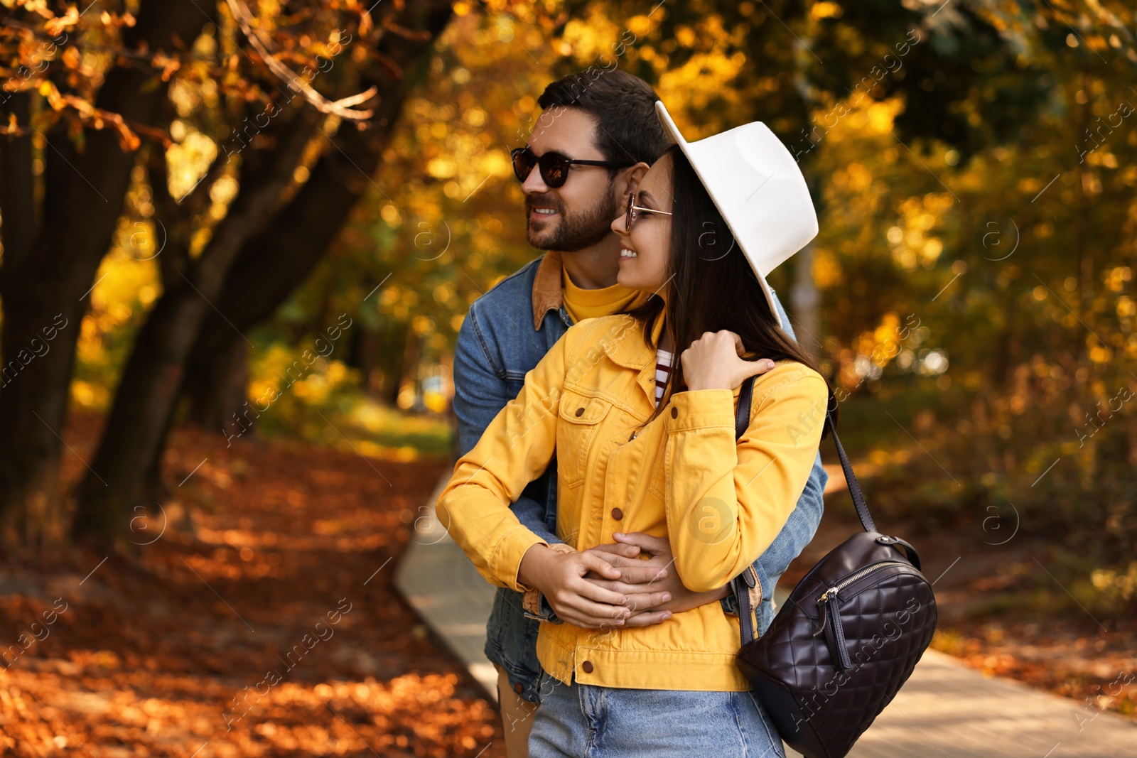 Photo of Beautiful couple in park on autumn day