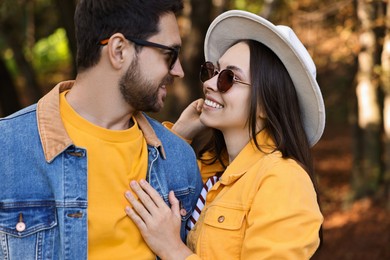 Photo of Beautiful couple in park on autumn day