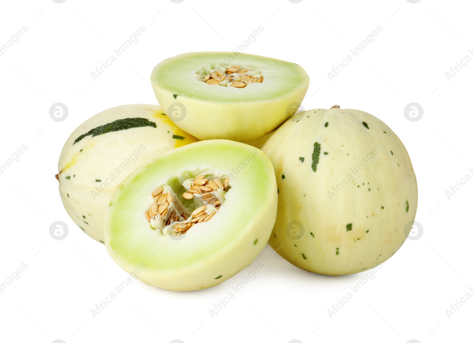 Photo of Whole and cut fresh ripe honeydew melons isolated on white