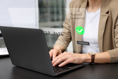 Image of Online payment system interface over computer. Woman working on laptop at desk in office, closeup