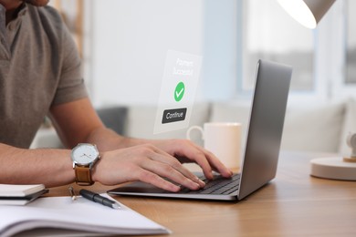 Image of Online payment system interface over computer. Man working on laptop at desk in office, closeup