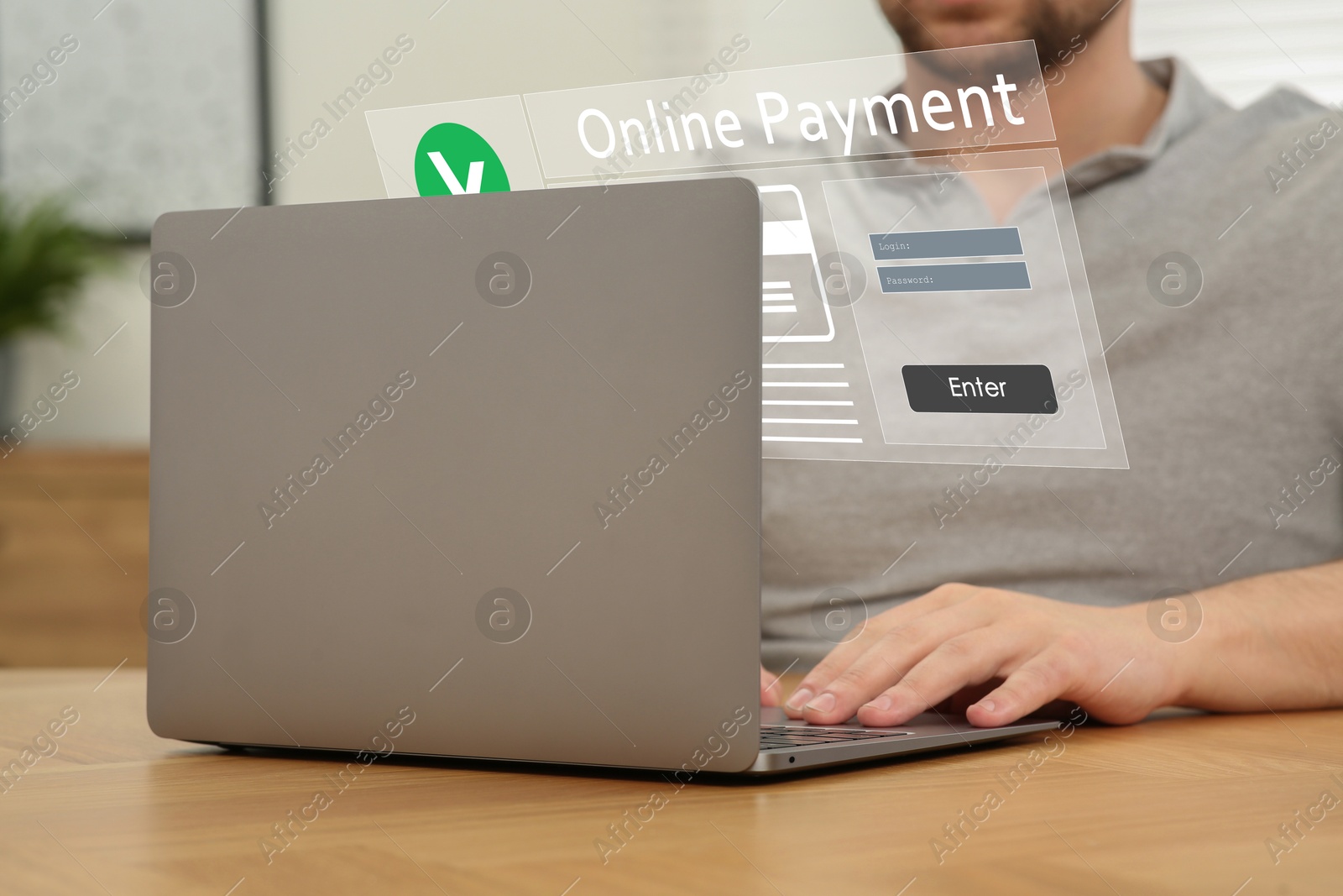 Image of Online payment system interface over computer. Man working on laptop at desk, closeup