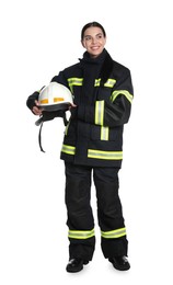 Full length portrait of firefighter in uniform with helmet on white background