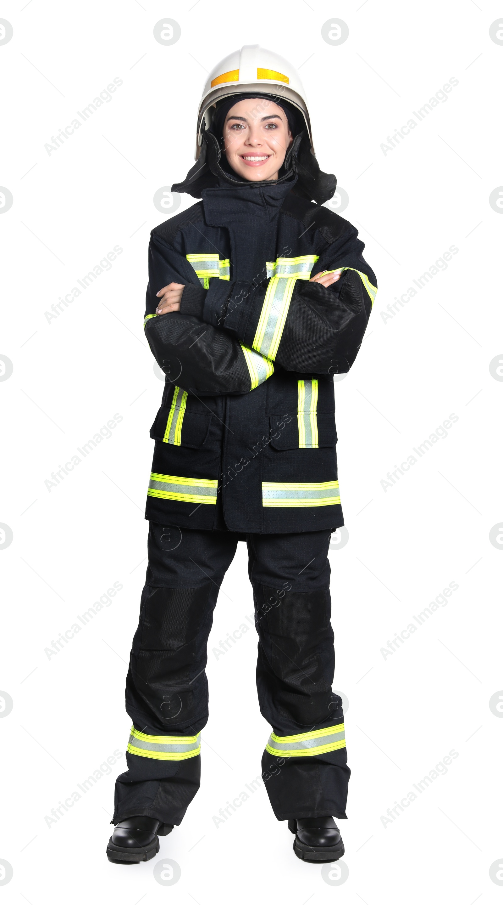 Photo of Full length portrait of firefighter in uniform and helmet on white background