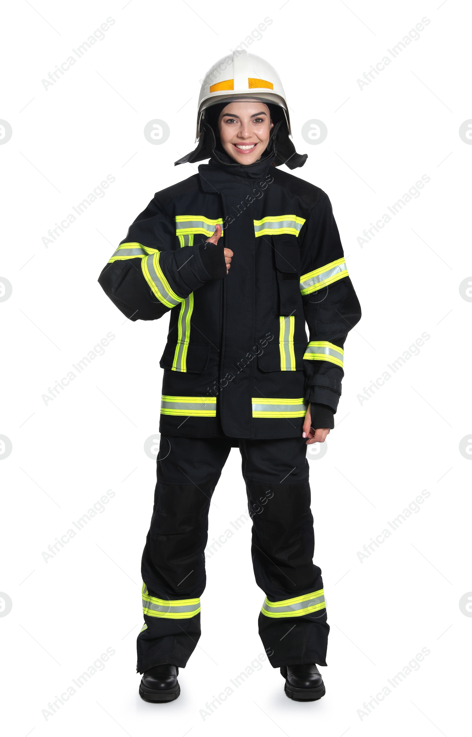 Photo of Full length portrait of firefighter in uniform and helmet on white background