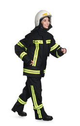 Full length portrait of firefighter in uniform and helmet on white background