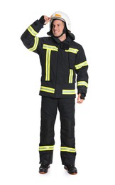 Photo of Full length portrait of firefighter in uniform wearing helmet on white background