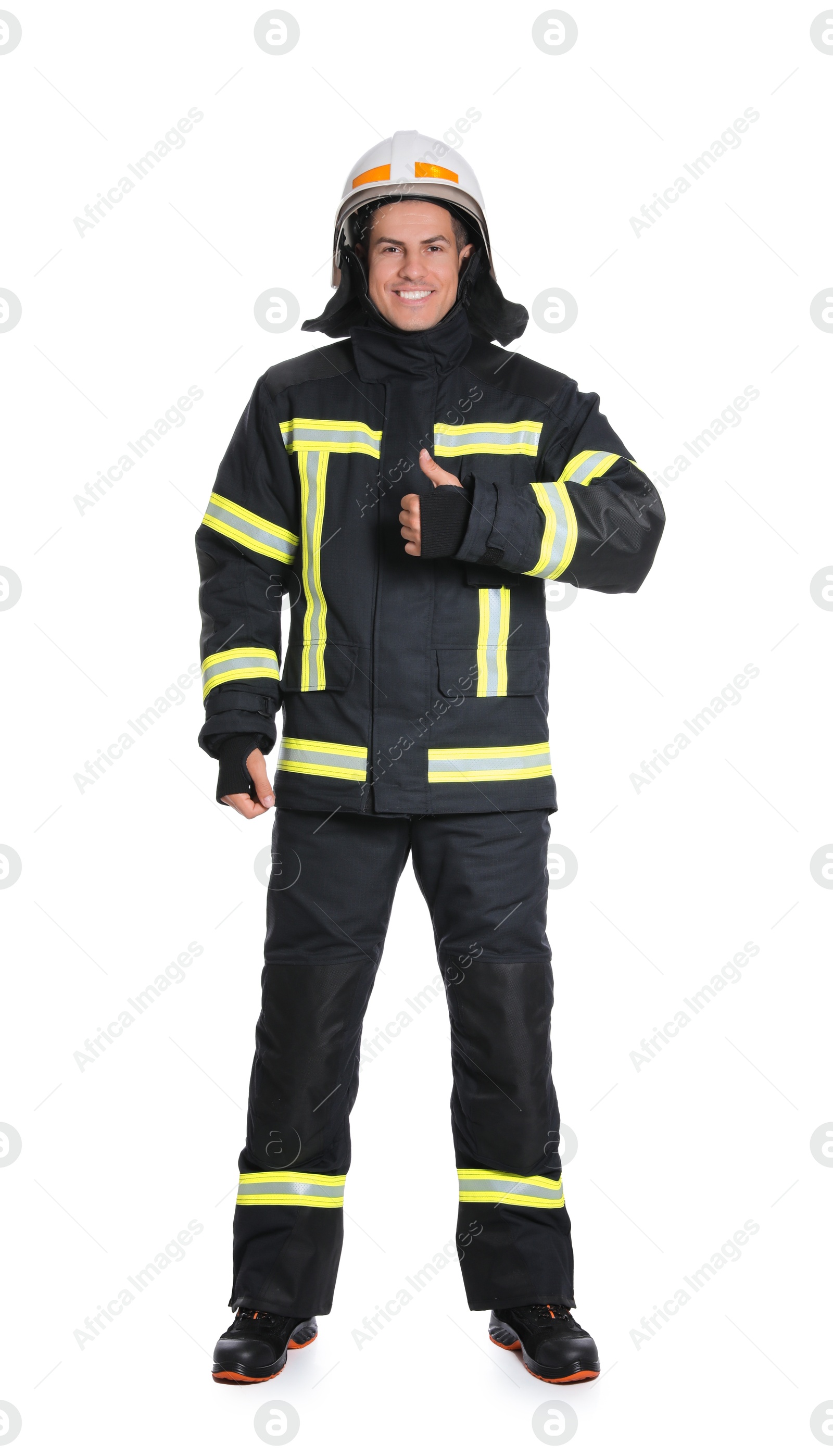 Photo of Full length portrait of firefighter in uniform and helmet on white background