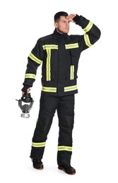 Full length portrait of firefighter in uniform with gas mask on white background