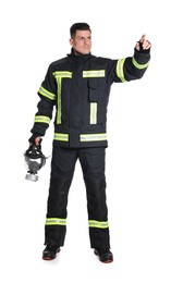 Full length portrait of firefighter in uniform with gas mask on white background