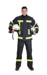 Photo of Full length portrait of firefighter in uniform with helmet and gas mask on white background