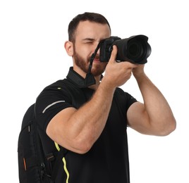 Photographer with backpack and camera taking picture on white background