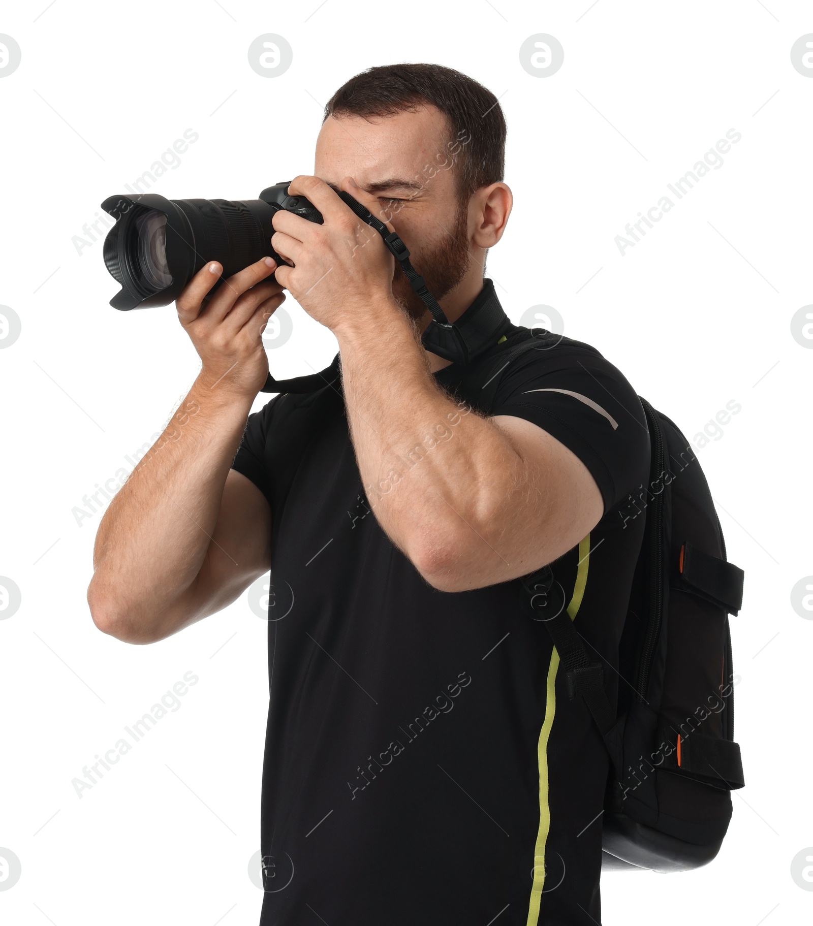 Photo of Photographer with backpack and camera taking picture on white background